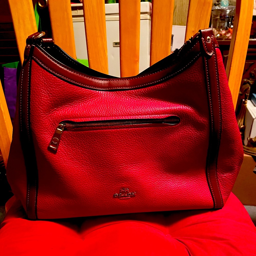 Red and brown leather handbag